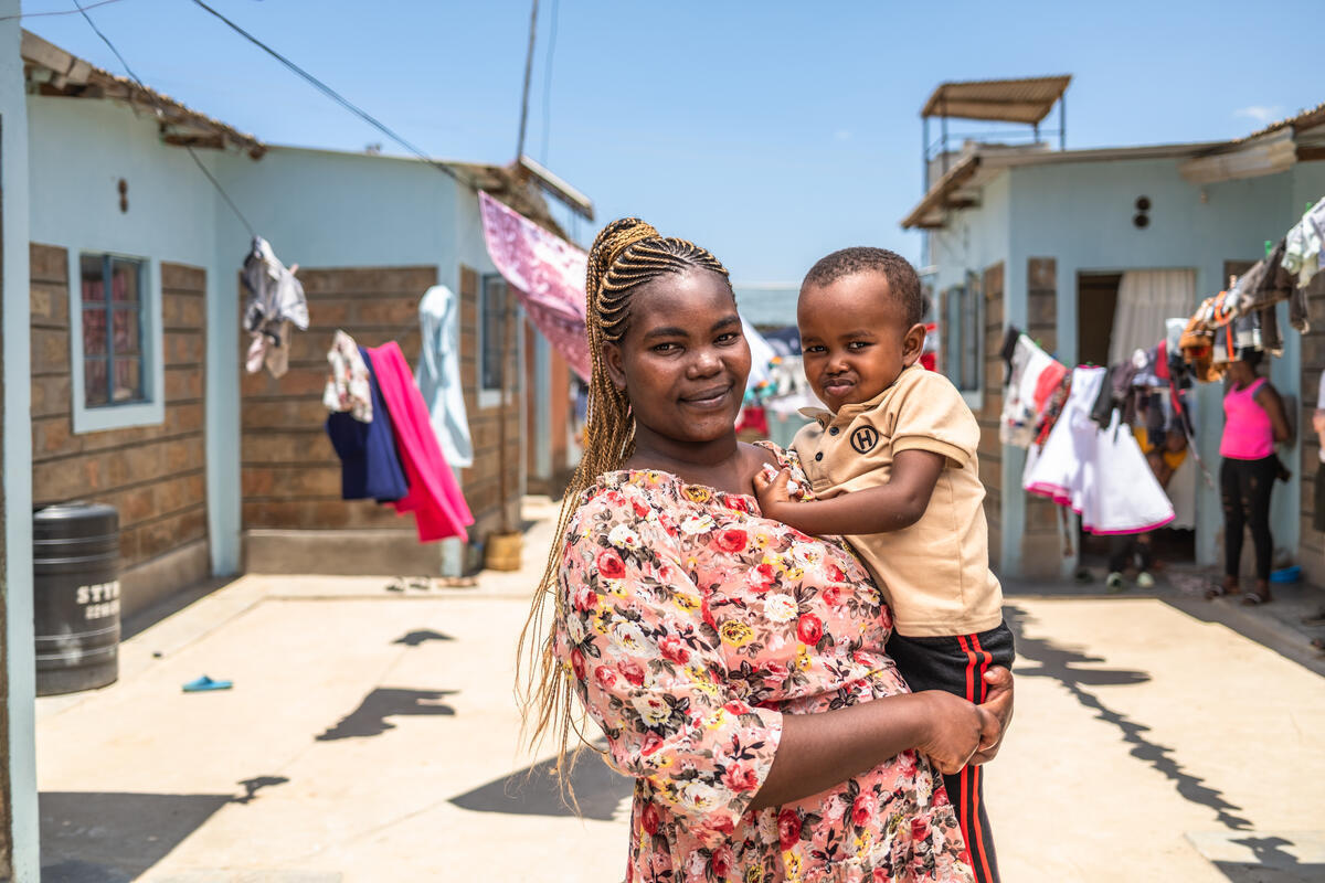 Christine and her son at their home in Wote, Makueni County, Kenya.