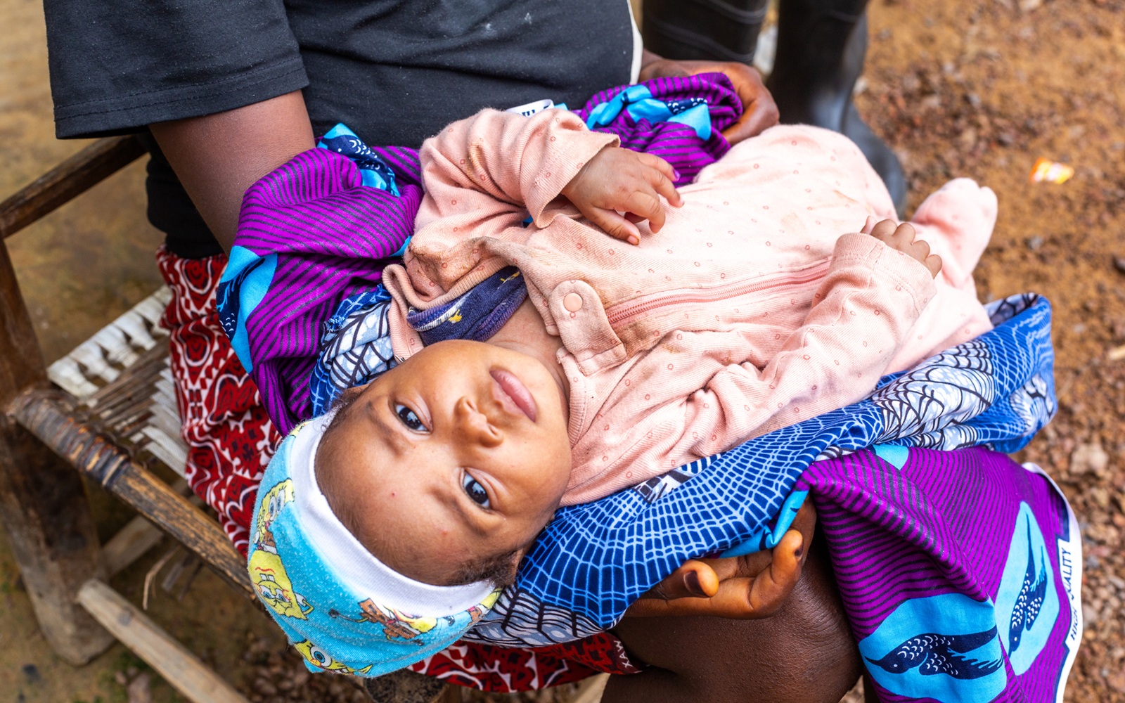 Child receiving care during an immunization campaign