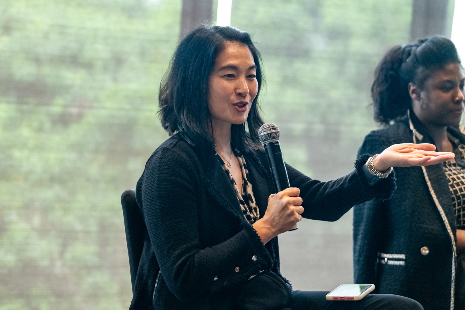 A women’s health leader speaking at a panel