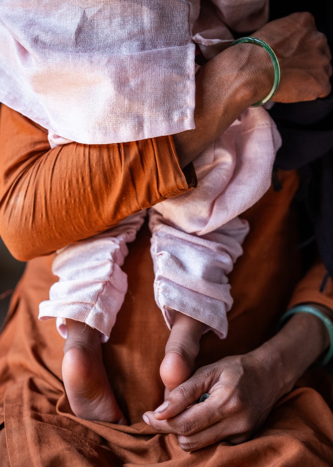 Manna Pathani, mother of four, seen with her youngest daughter, Sumaiya Pathani, who is identified as severely malnourished in Banke District, Narainapur Village, Nepal, on March 9, 2025.
