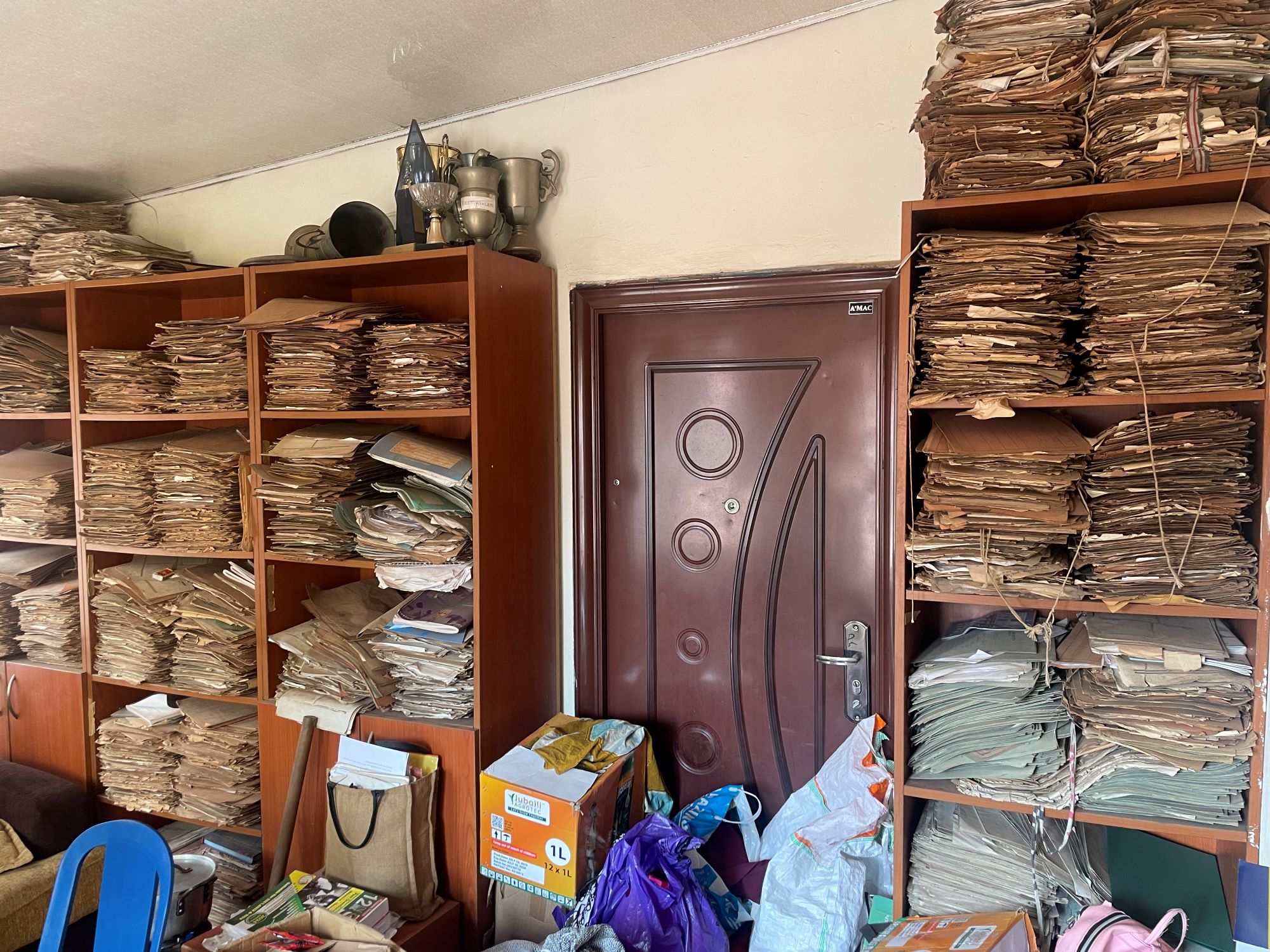 A repository of education certificates in a Nigerian school.