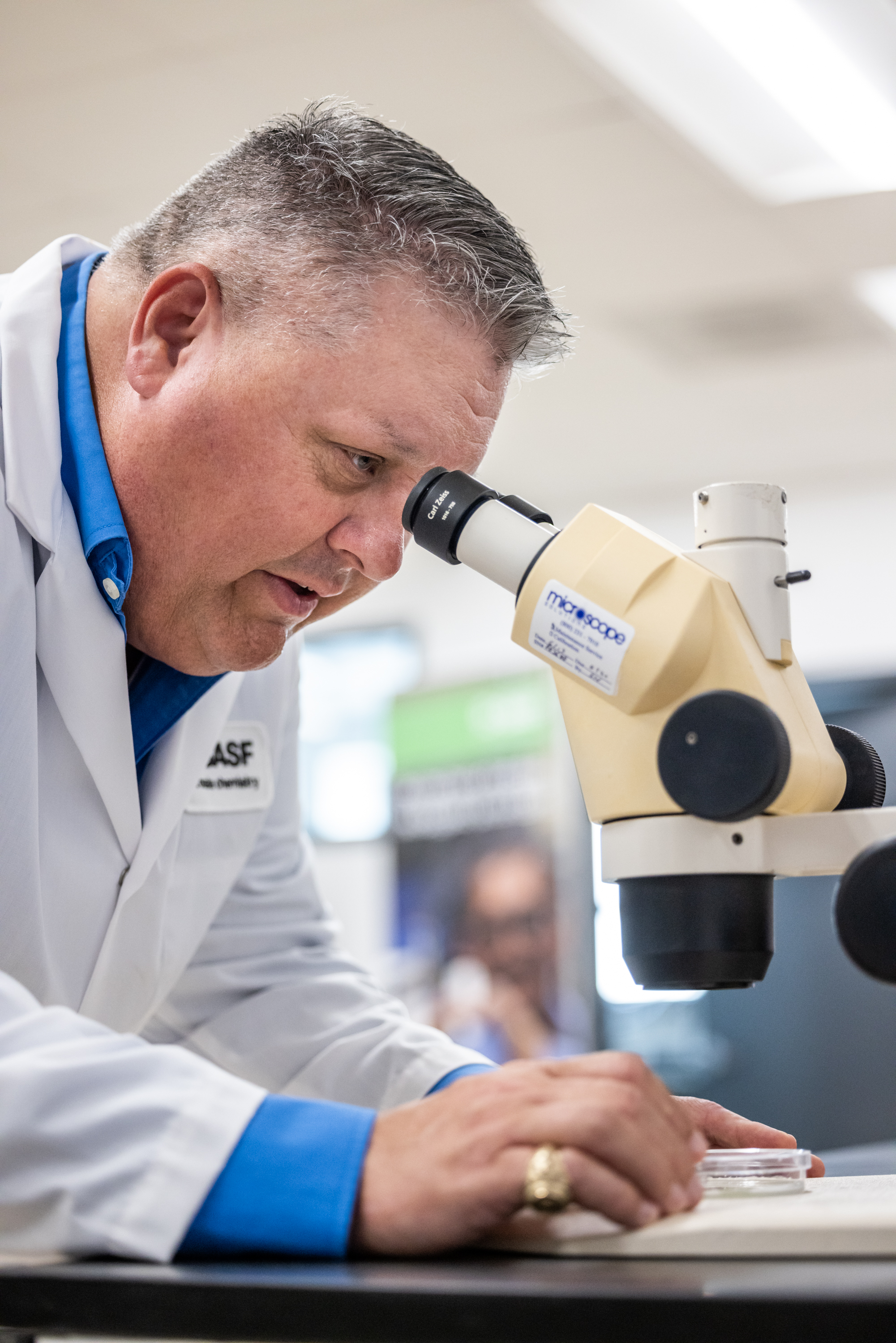James W. Austin works in the lab at the BASF campus in Durham, NC.