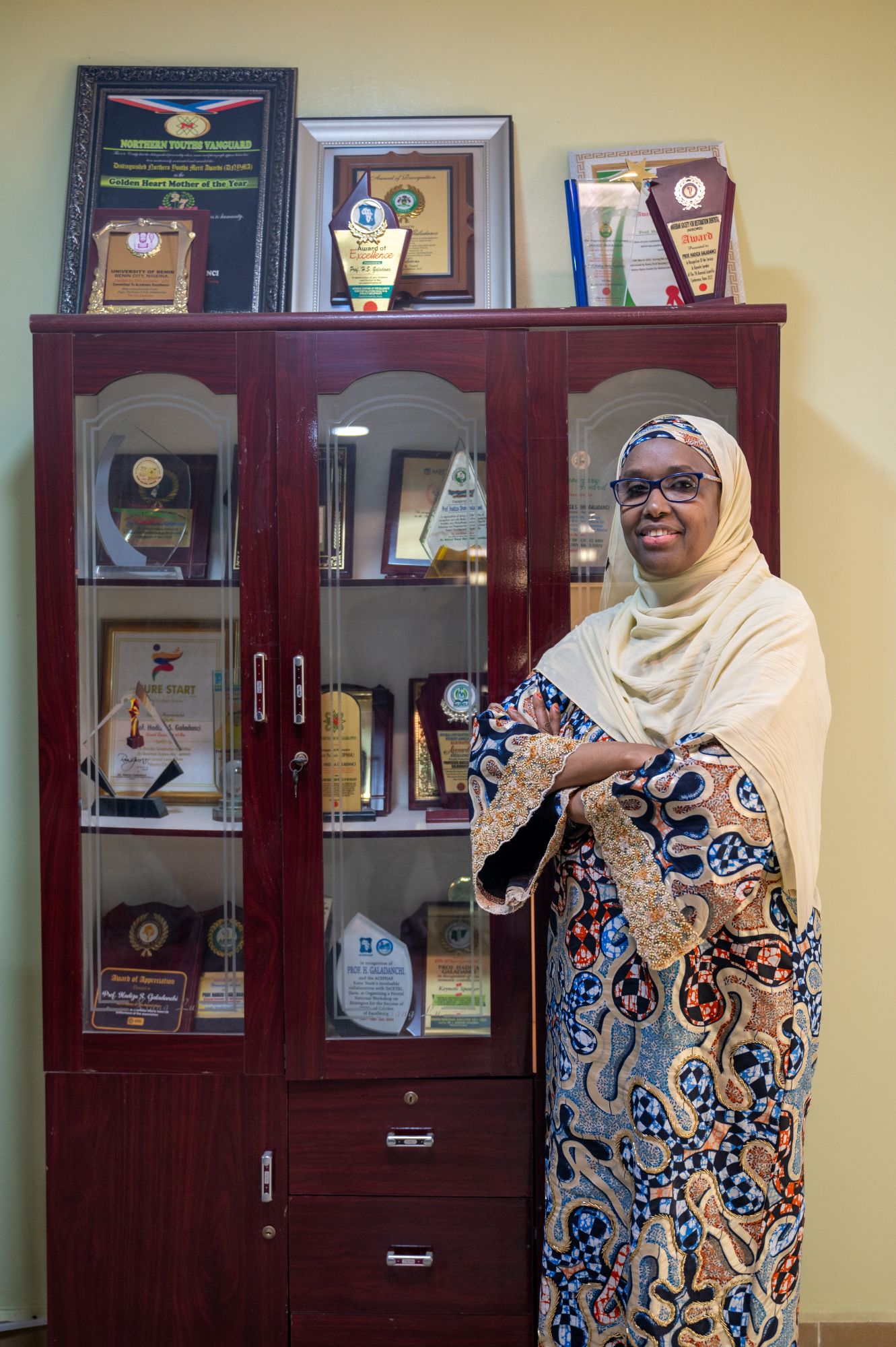 Portrait of Prof. Dr. Hadiza Shehu Galadanci in her office by her awards at the African Center of Excellence for Population Health and Policy (ACEPHAP), Aminu Kano Teaching Hospital, in Kano, Kano State, Nigeria on January 19, 2026.