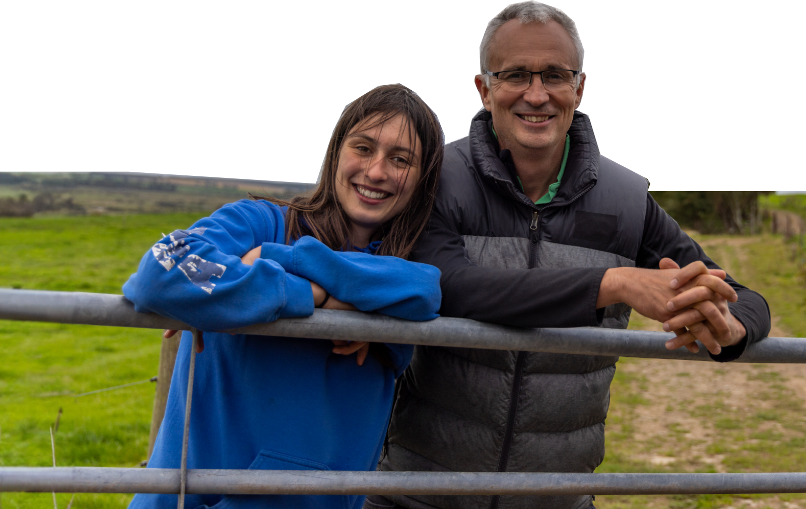 Rory Christie with his daughter at the Dourie Farming Company in Port William, Scotland.