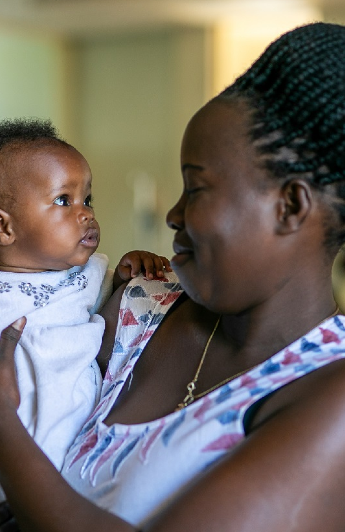 A caregiver with a young child
