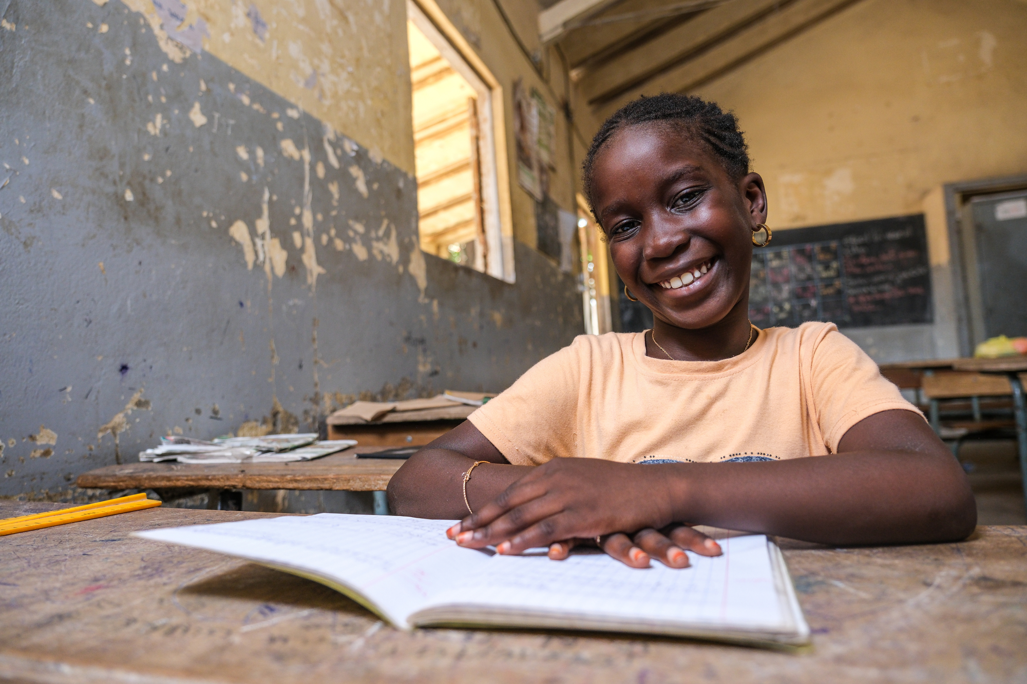 Student Fatou Ndiaye poses for a portrait in a classroom that is part of the Associates in Research and Education for Development (ARED) program in Dakar, Senegal.