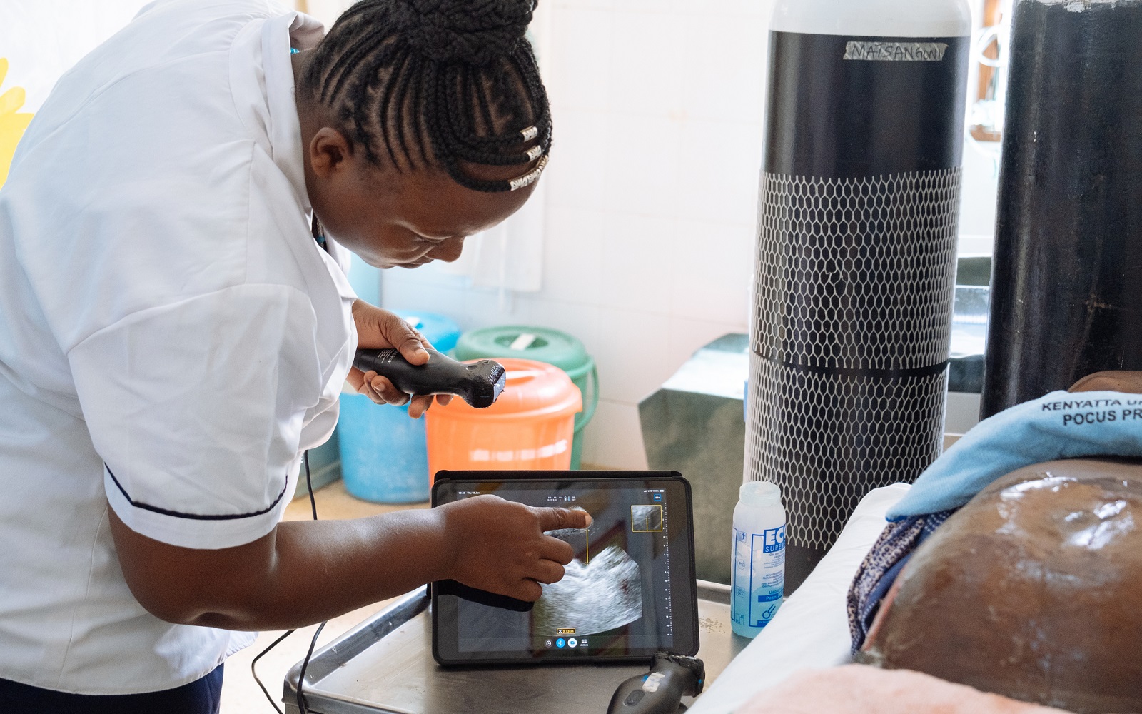A handheld ultrasound scan in a clinic