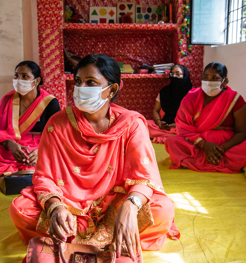 Women participate in a community health and nutrition review session in Uttar Pradesh.